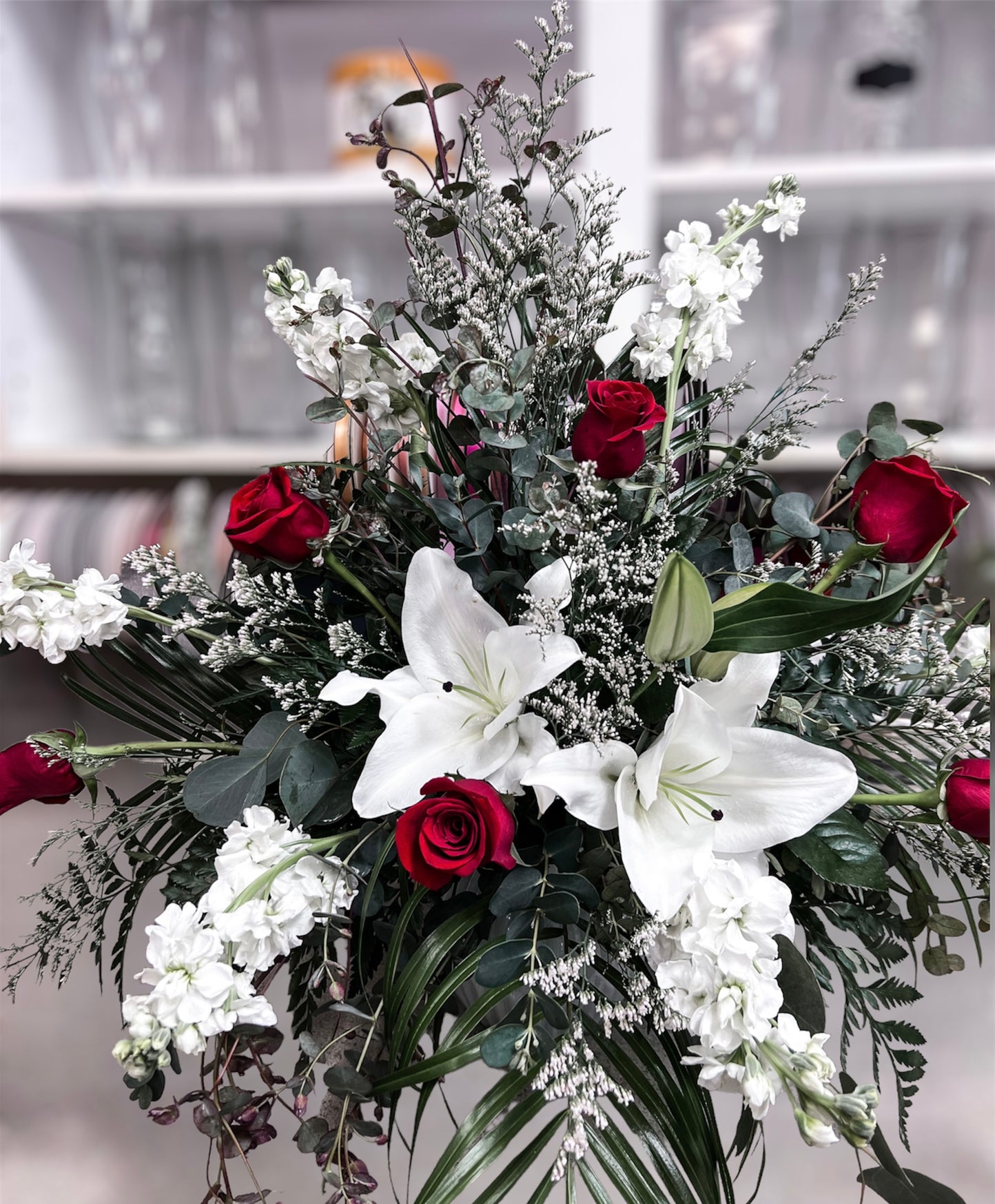 Splash of Red Funeral Arrangement